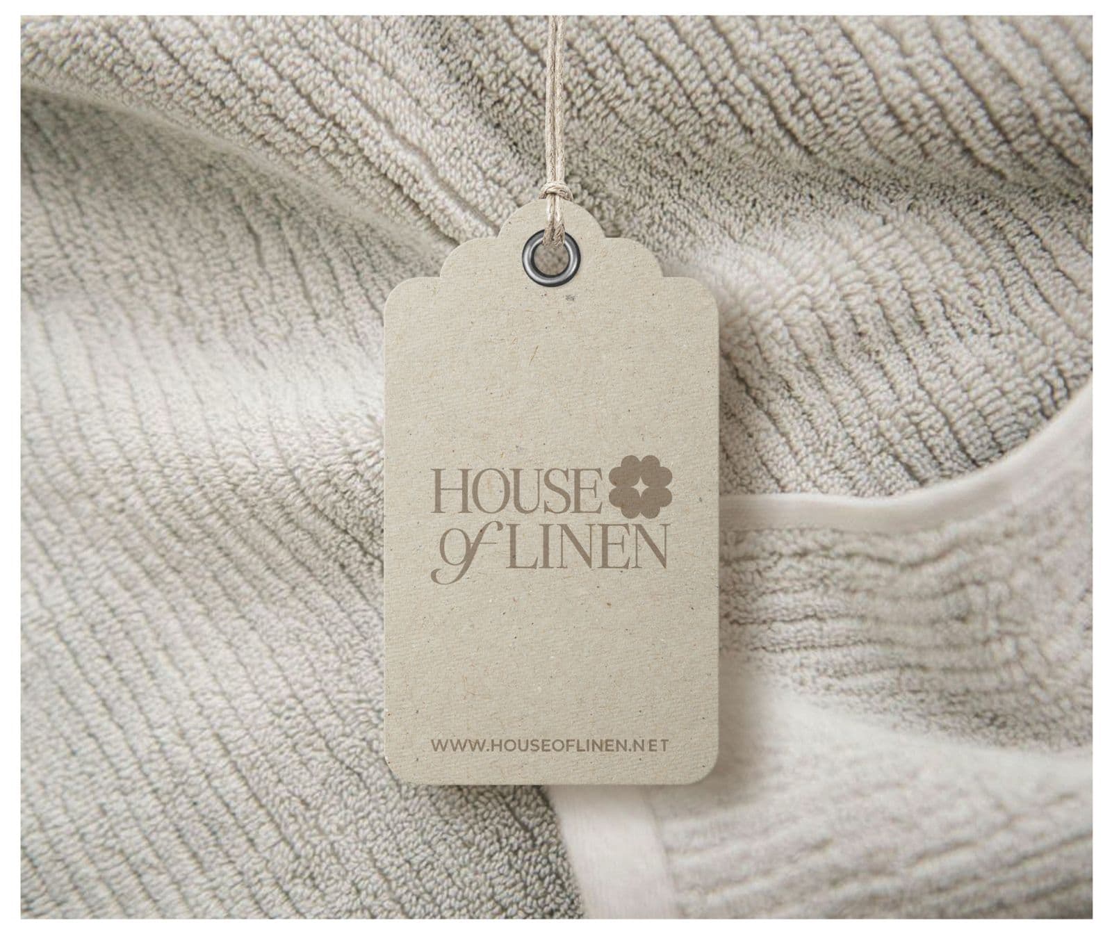 House of Linen paper label on a neutral terry textile