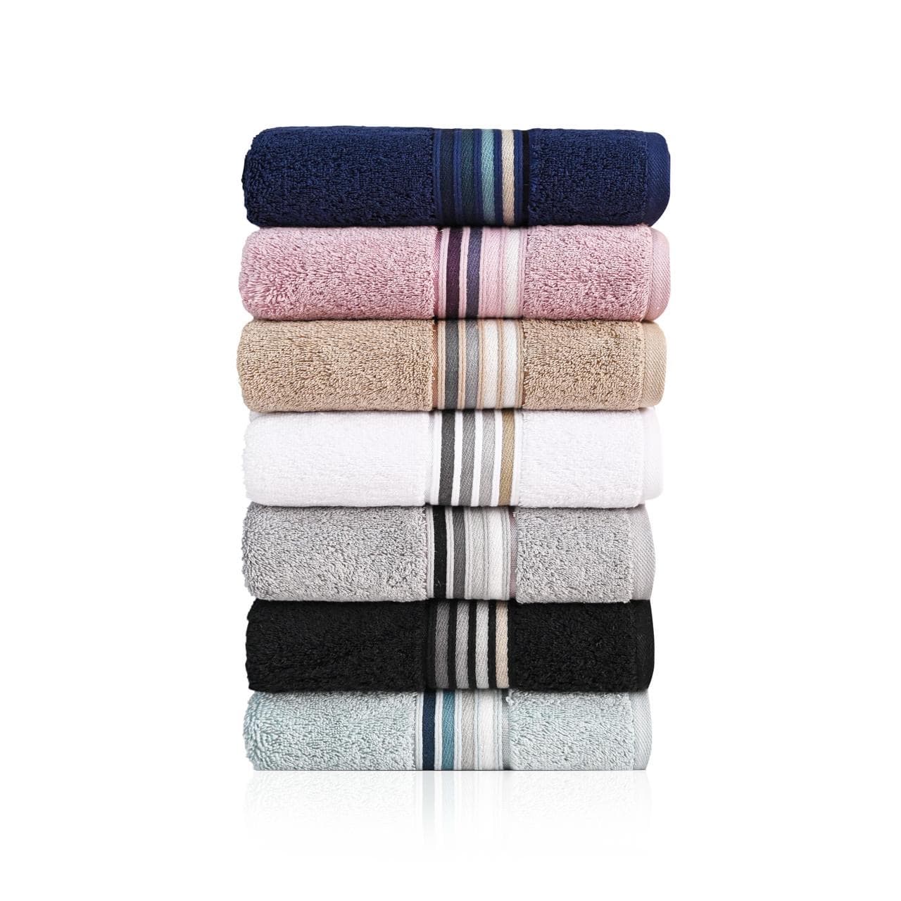 A full stack of seven House of Linen towels in different colours